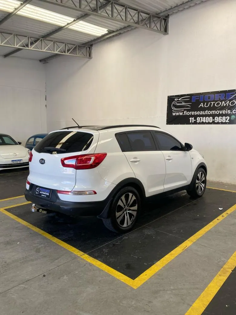 Kia Motors - Sportage LX 2.0 16V/ 2.0 16V Flex  Aut.  Gasolina